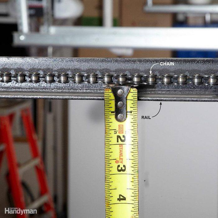 Checking the chain tension on a garage door opener