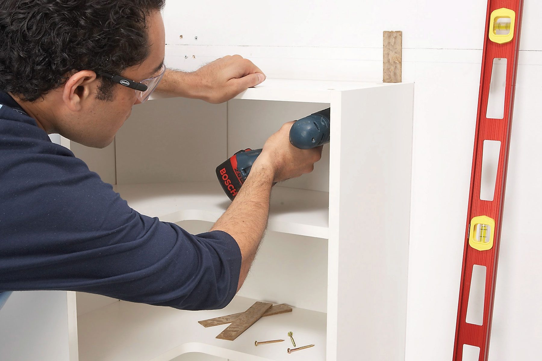 Mount the lower cabinets