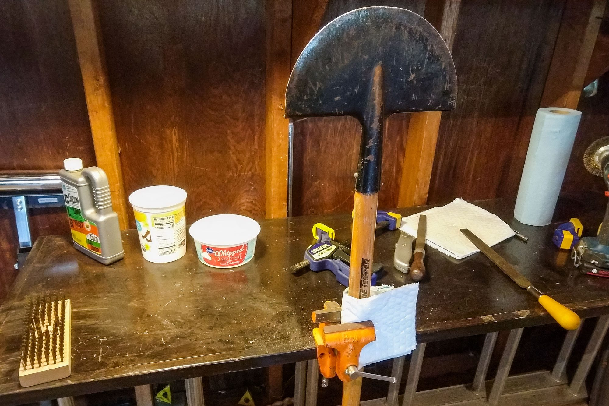 Edger held in Clamps