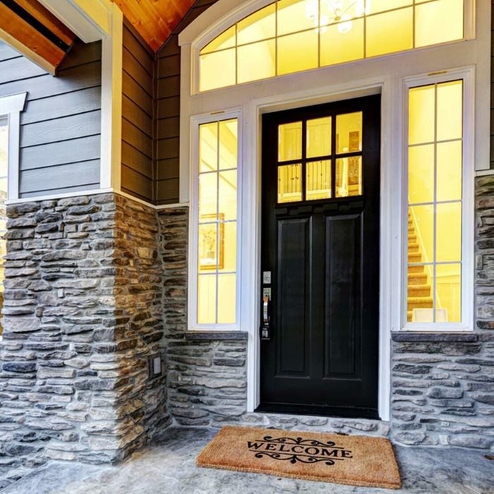 black front door stone work exterior