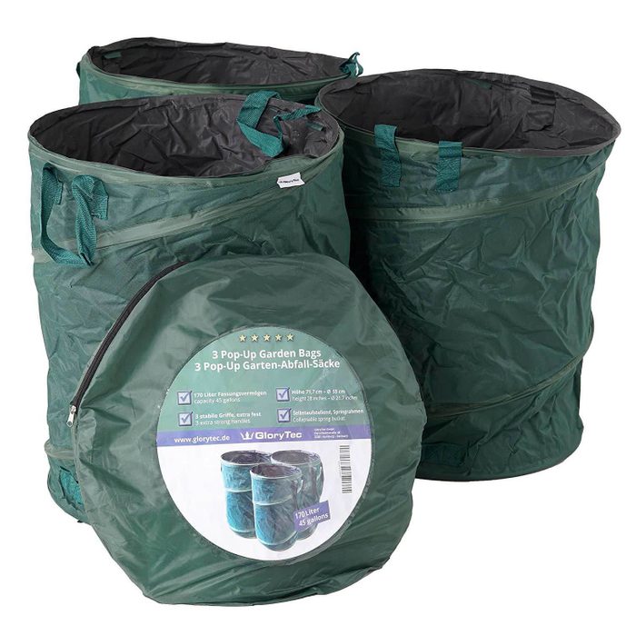 Three green pop-up garden bags sit upright, designed for collecting yard waste. They are accompanied by a flat package containing details about their capacity and usage.