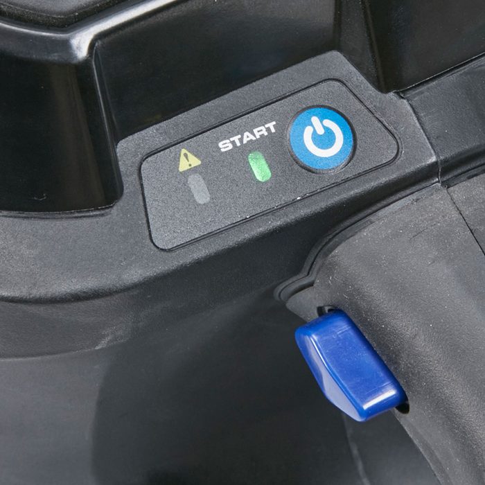 A device with control buttons is displayed. The