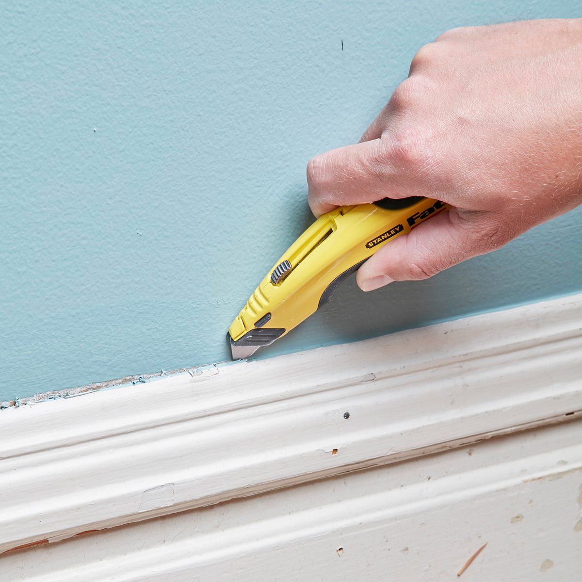 Slice the Paint away from the trim and the wall
