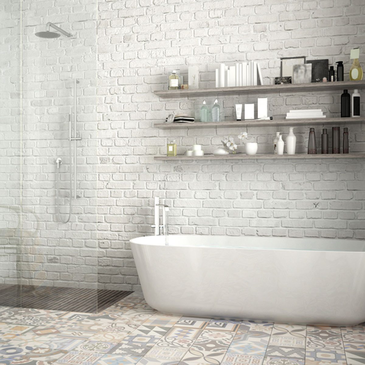 A white bathtub sits prominently in a modern bathroom, beside a glass shower and shelves holding various toiletries, against a textured brick wall.