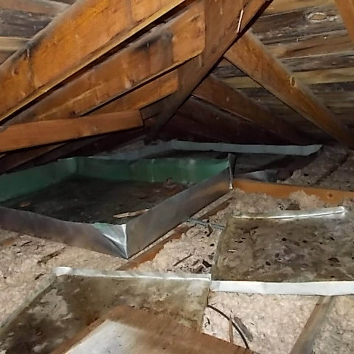 Why fix a roof leak when you have cookie sheets?