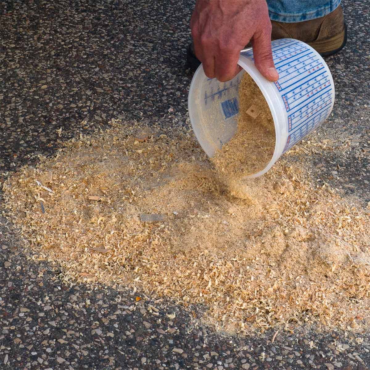 spread sawdust over oil spill