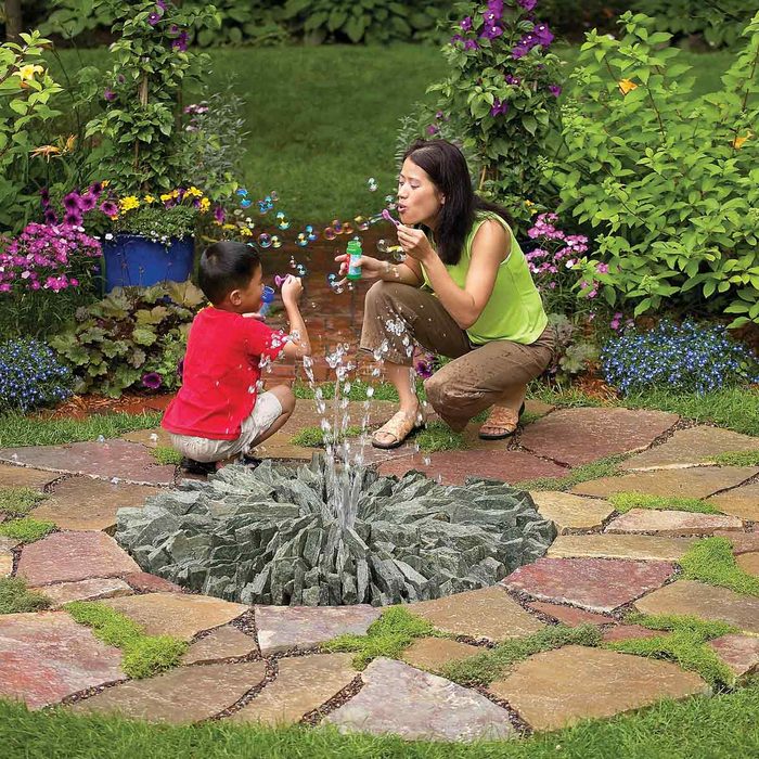 stone fountain backyard