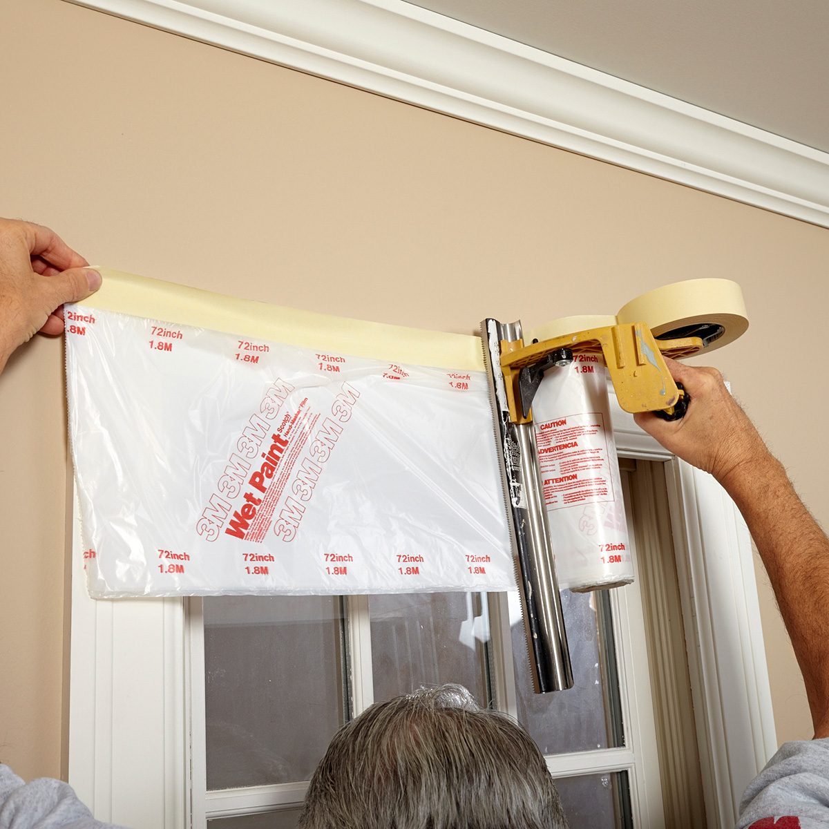 Completely cover your windows with roll on plastic | Construction Pro Tips