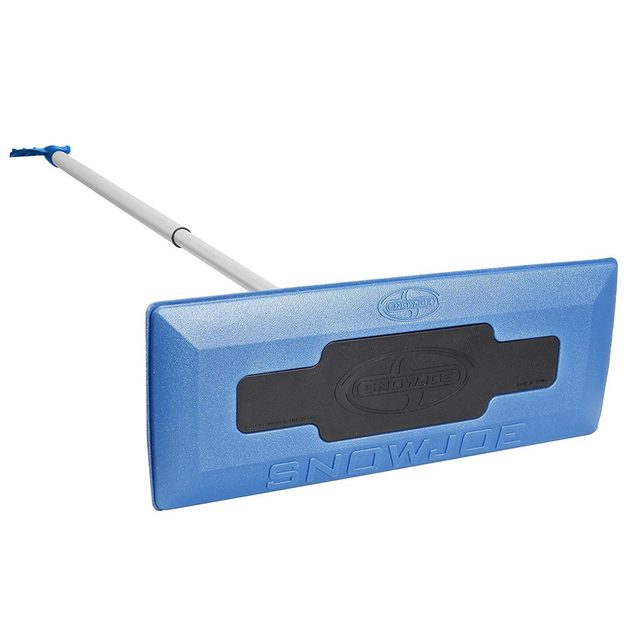 A blue snow shovel with a wide plastic blade and a telescopic handle rests horizontally, designed for clearing snow from flat surfaces.