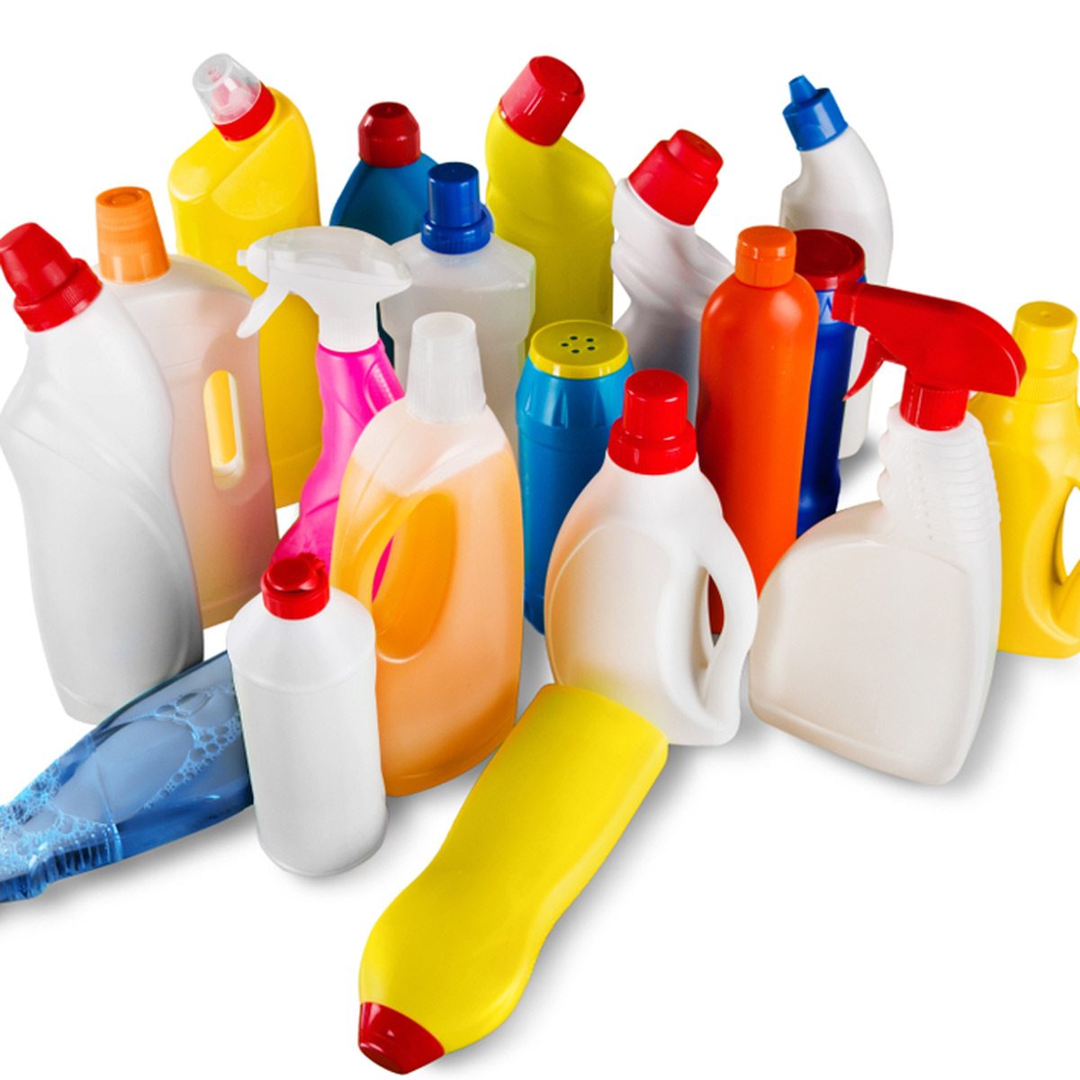 A variety of colorful cleaning product bottles are clustered together, showcasing different shapes and sizes, on a plain white background.