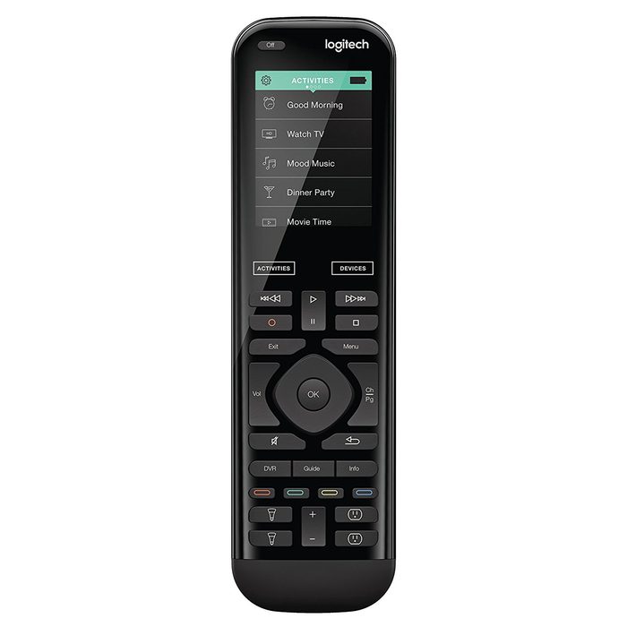 A black remote control displays various activities like 