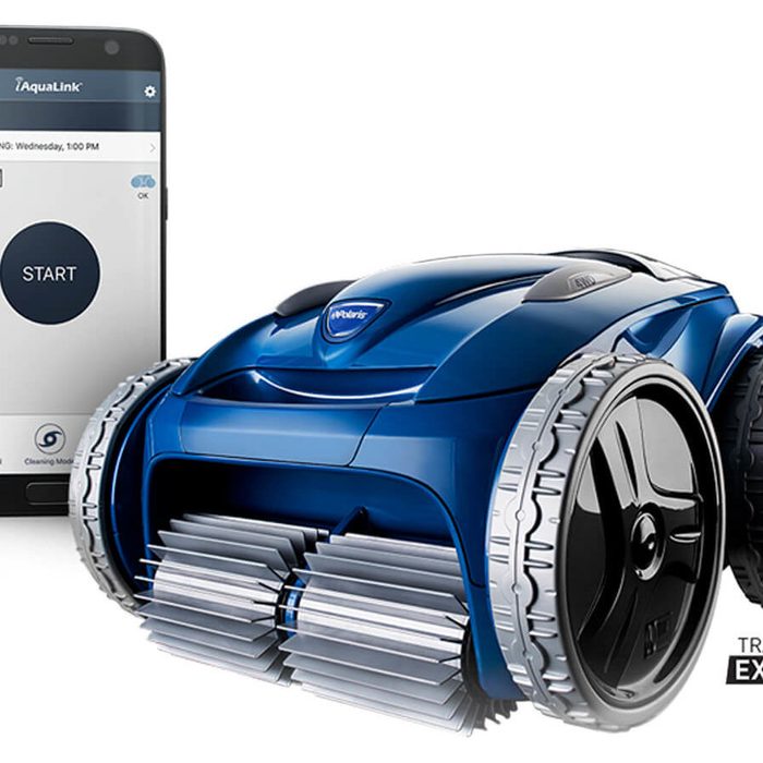A blue robotic pool cleaner is positioned next to a smartphone displaying cleaning options, indicating it is designed for automated pool maintenance.