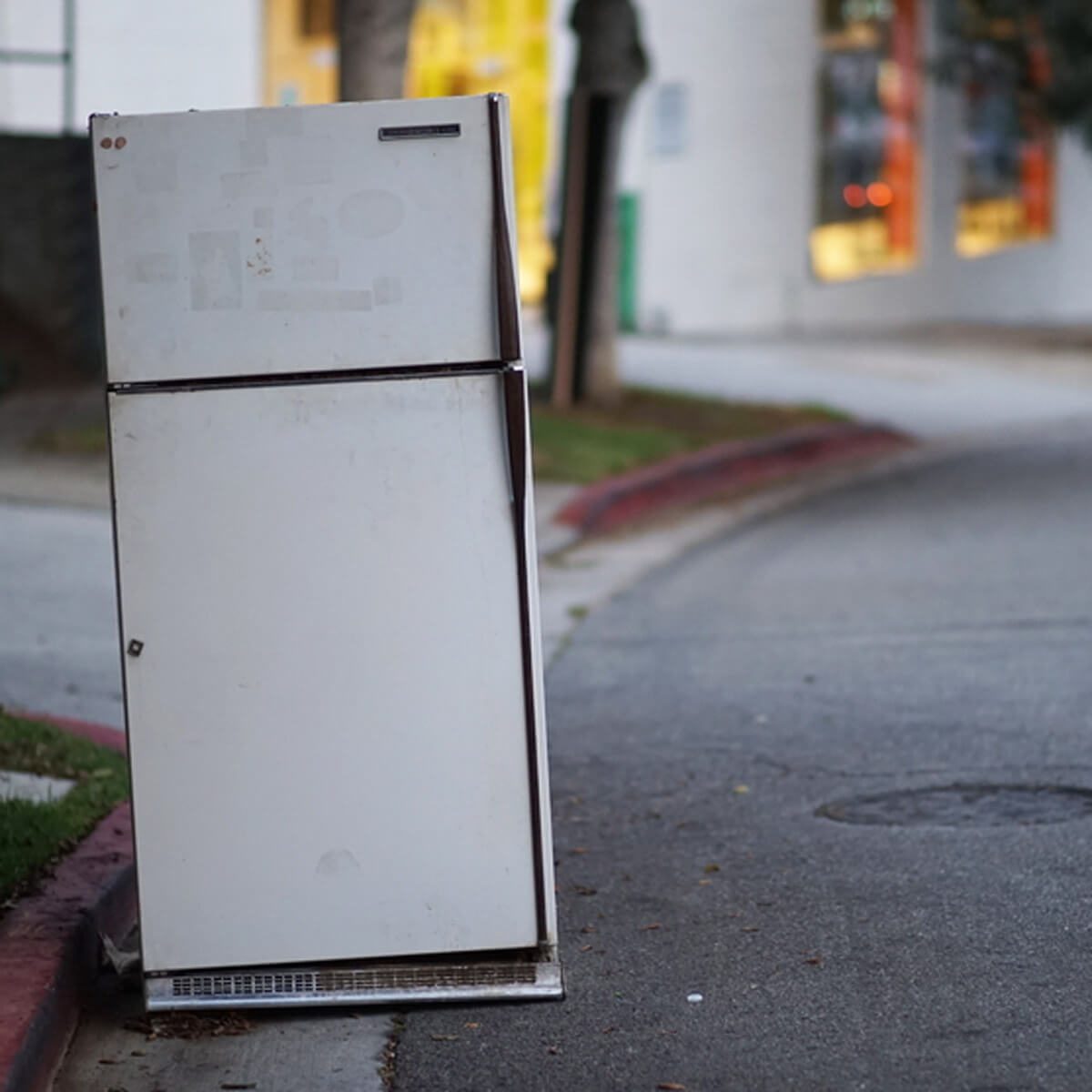 refrigerator on curb appliance pick-up 
