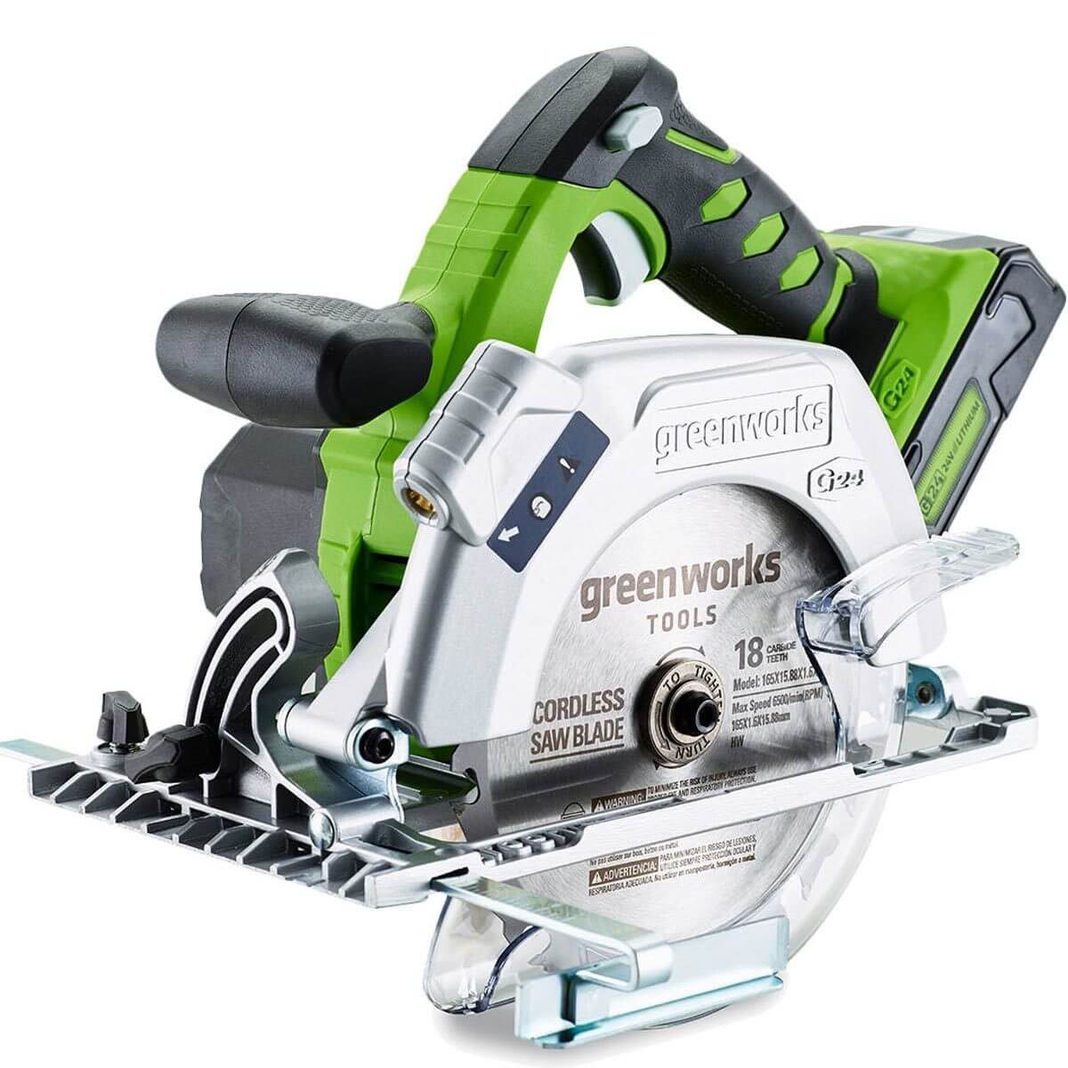A cordless circular saw with a green and black handle rests stationary. Its sharp metal blade is designed for cutting wood or materials in construction.