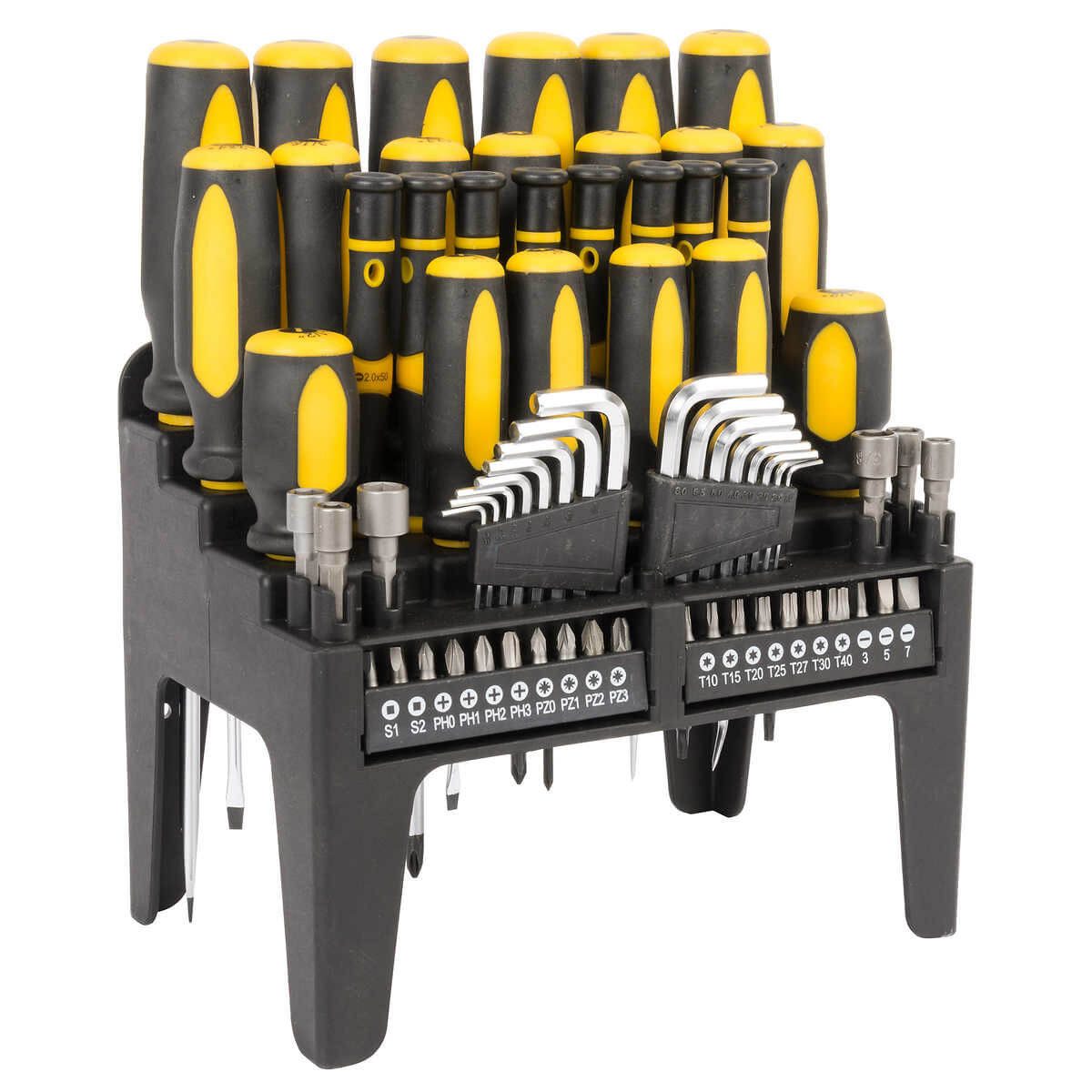 A tool organizer displays various screwdrivers and bits, standing upright on a black base, efficiently arranged for easy access in a workspace.