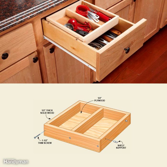 A wooden kitchen drawer is partially open, revealing various utensils and a smaller organizer. The setting includes a countertop and wooden cabinetry.