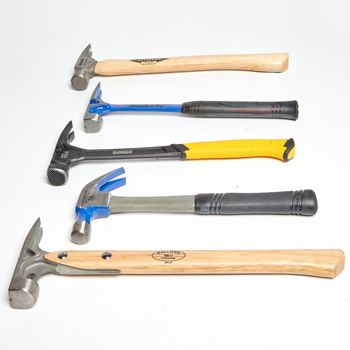 Five hammers laying on their sides