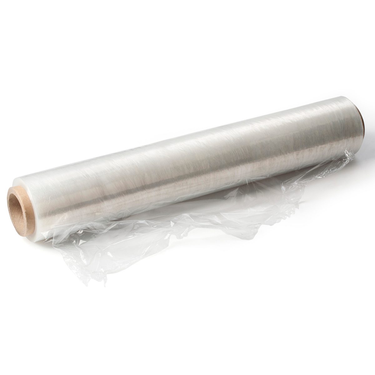 A roll of clear plastic wrap rests on a surface, partially unrolled, surrounded by loose plastic edges, commonly used for food preservation.