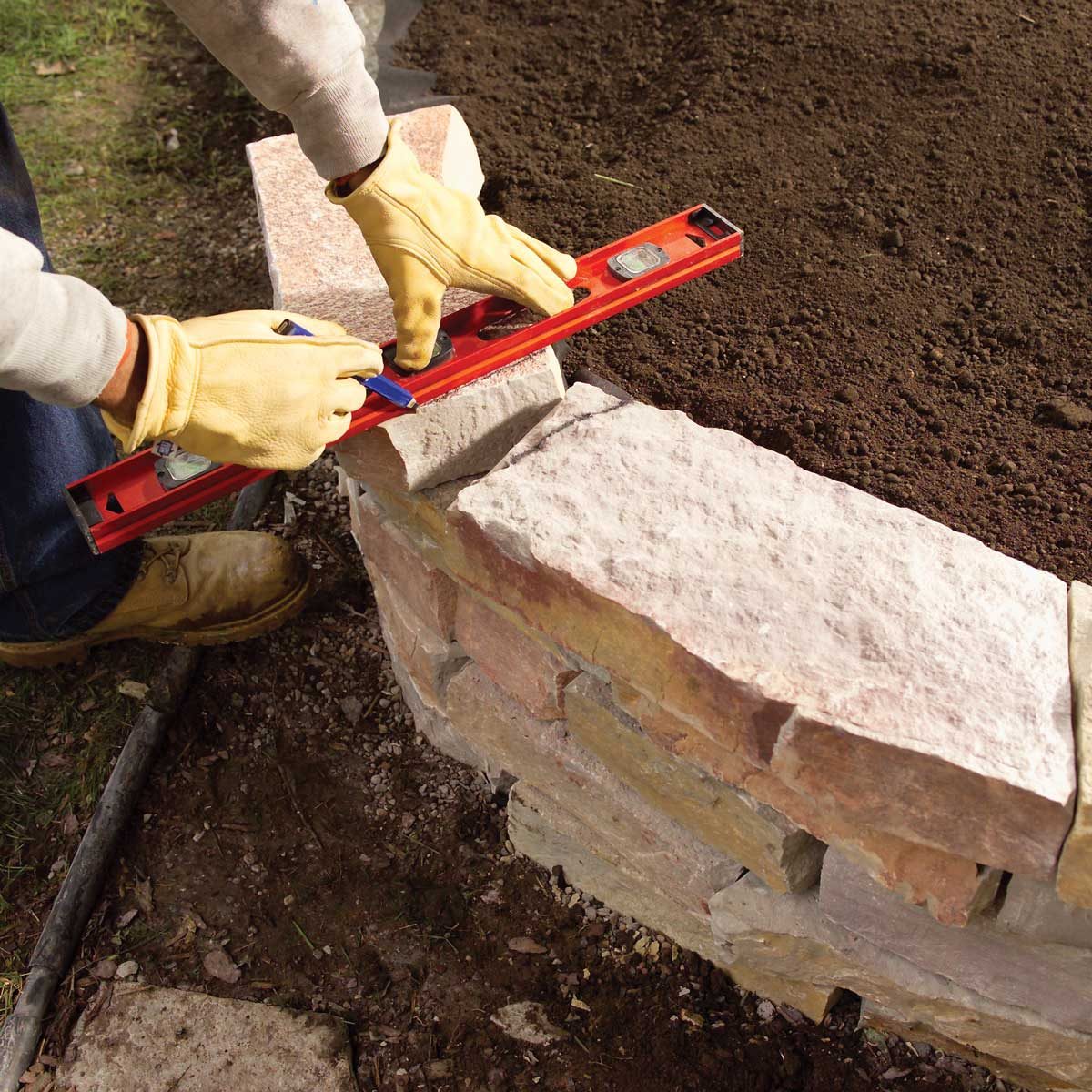 Level the last course and dry-fit the capstones