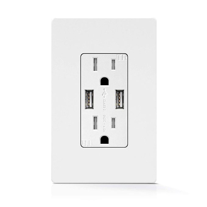 A wall outlet features two standard plug sockets and two USB ports, designed for powering devices in a household or office setting.