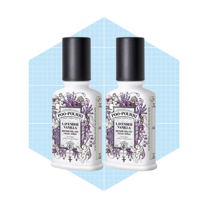 Two bottles of Poo-Pourri spray, labeled 
