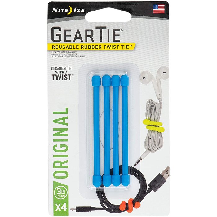 Four blue reusable rubber twist ties are packaged, demonstrating organization for various cords like earbuds and USB cables in a clean, product-focused design.