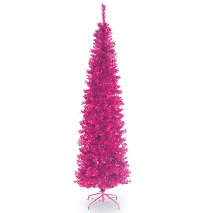 A tall, pink artificial Christmas tree stands upright on a metal base, surrounded by a plain white background, ready for decoration.