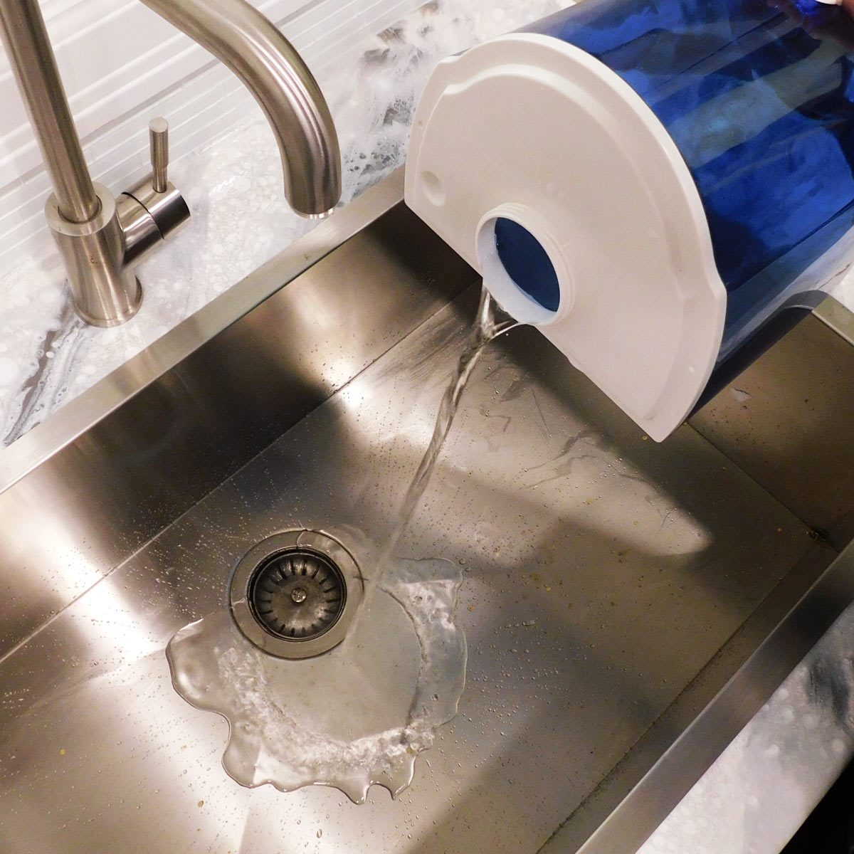 pouring out water from humidifer