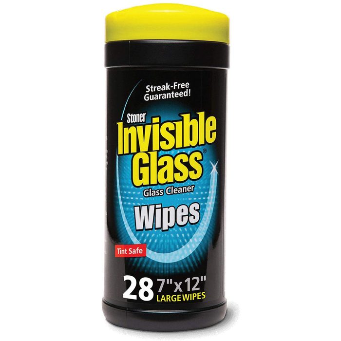 A cylindrical container with a yellow lid holds glass cleaner wipes, displaying features like 