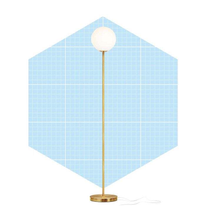 A tall, golden floor lamp with a round white shade stands against a light blue grid-patterned background.