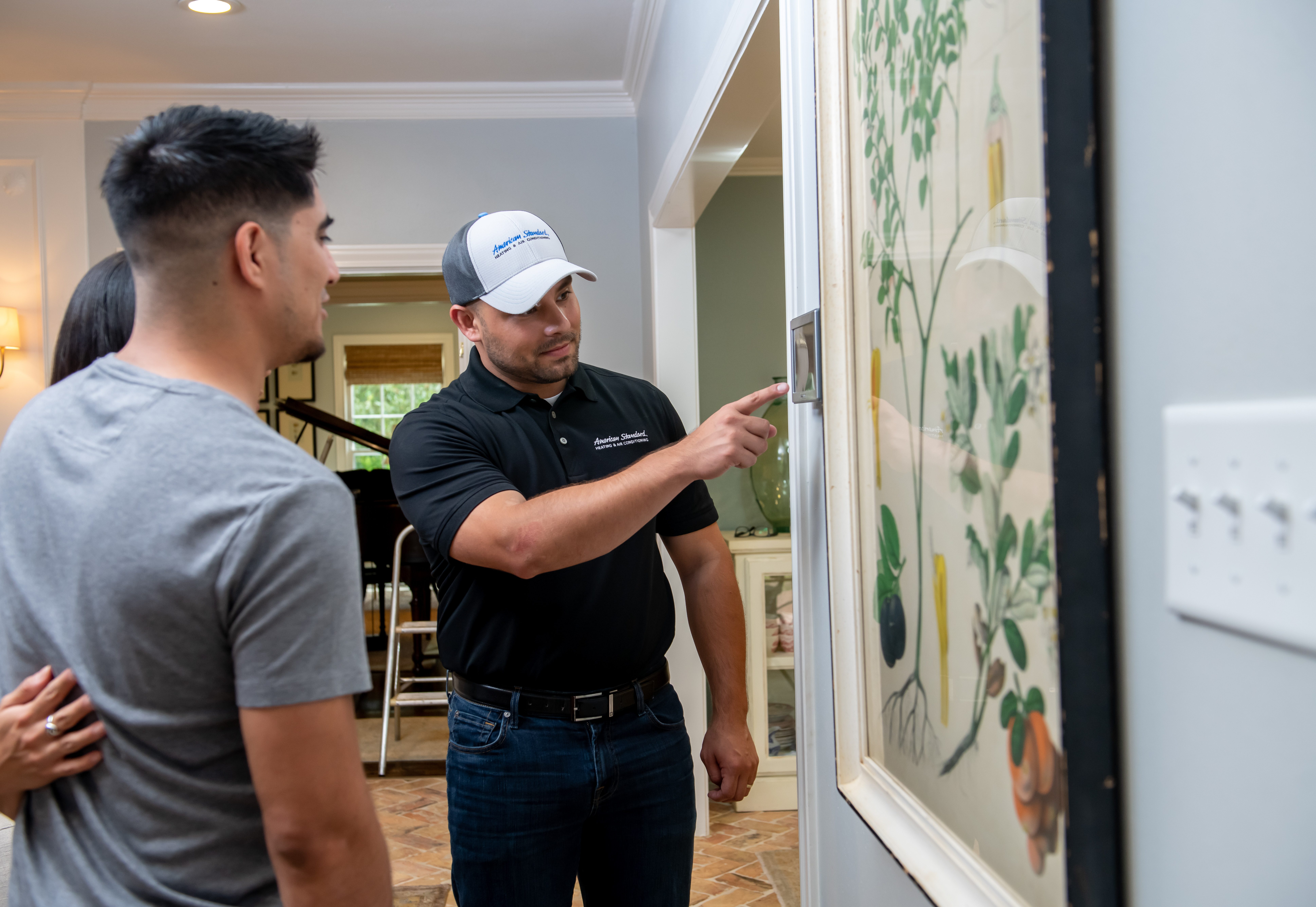 Men inspecting vents