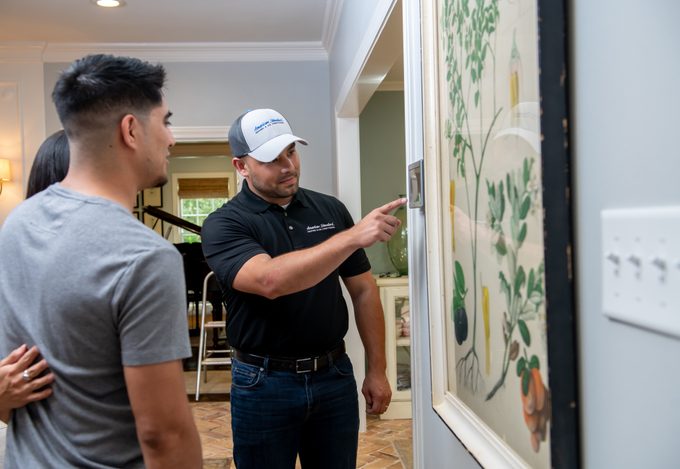 Men inspecting vents