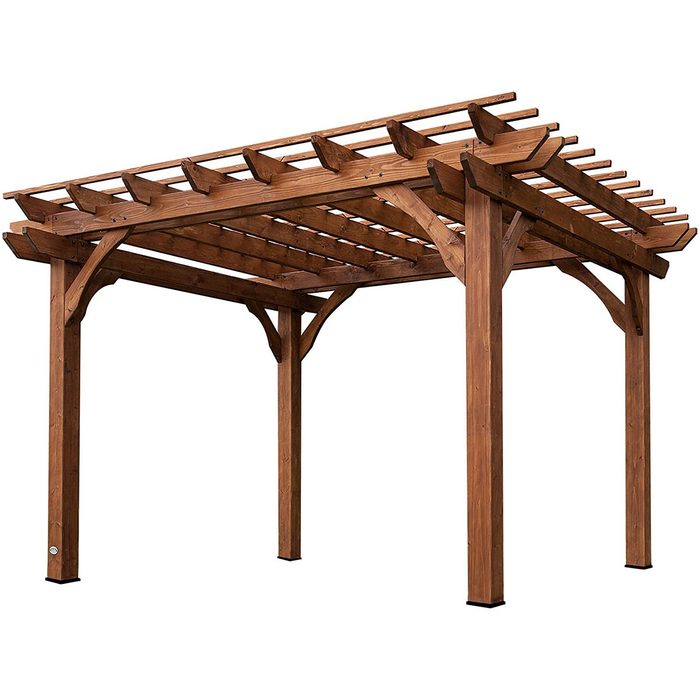 A wooden pergola stands prominently, featuring slatted roofing and sturdy posts, providing a shaded area suitable for relaxation or outdoor gatherings.