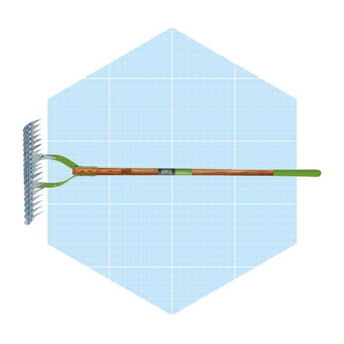 A garden rake lies flat, designed for soil aeration. It features a long handle and metal tines, set against a light blue grid background.