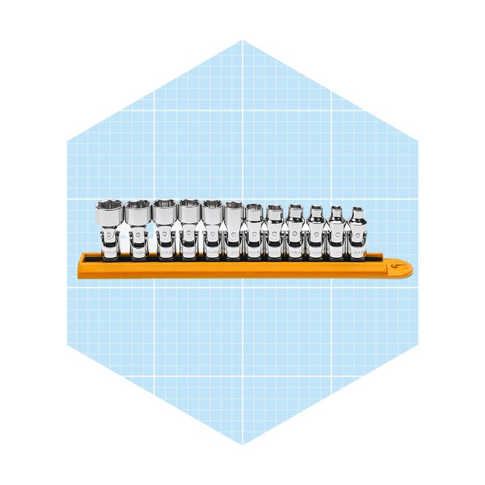 A tray of metallic socket wrenches is organized neatly, showcasing various sizes on a bright orange holder against a light blue grid background.