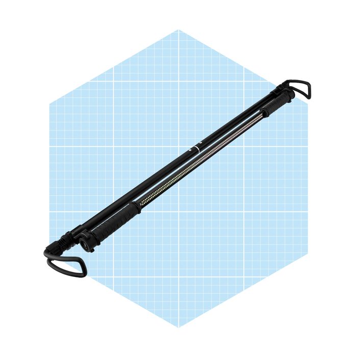 A black, extendable pole with grips on both ends is displayed against a light blue grid background, suggesting use in various tasks or activities.