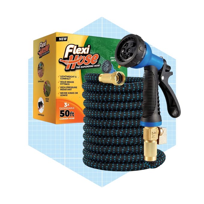 A 50-foot expanding garden hose rests beside a spray nozzle, set against a box listing its features, including lightweight and high-pressure resistance, with a blue pattern.