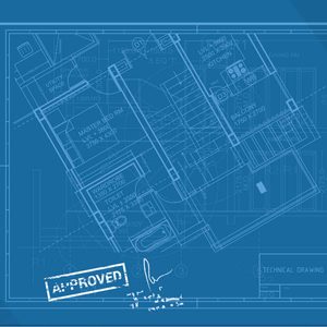 A blue architectural blueprint details room layouts, dimensions, and annotations, featuring a stamp with