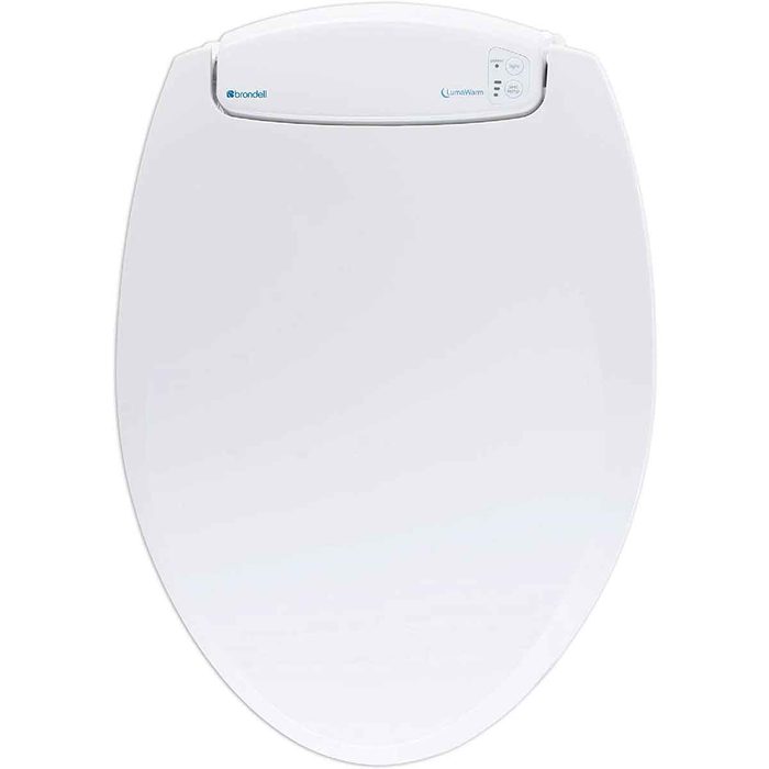A white toilet seat with a control panel sits against a plain background, designed for comfort and warmth during use.