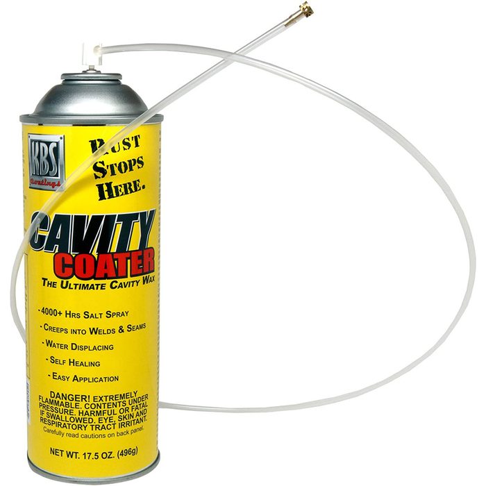 A cylindrical spray can labeled 