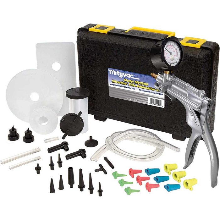 A vacuum pressure testing kit, featuring a hand pump, gauge, various adapters, and components, neatly arranged in a sturdy black carrying case.