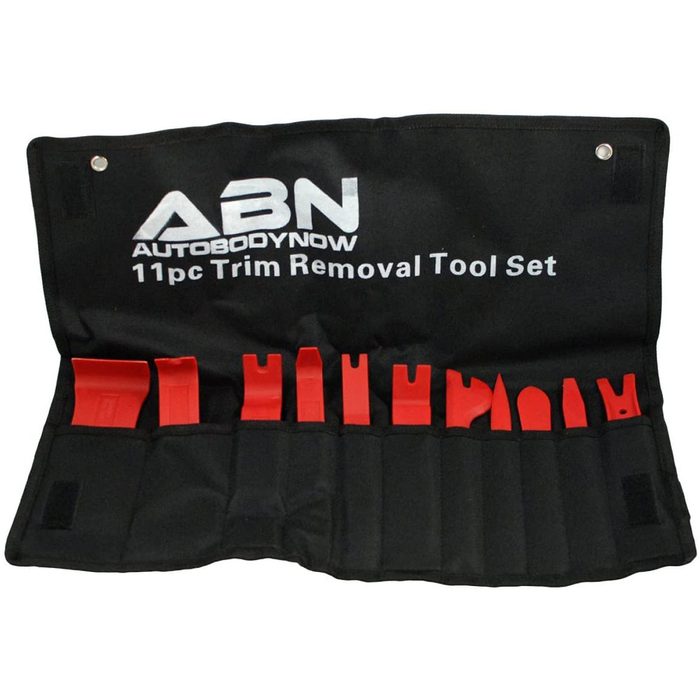 A black roll-up tool pouch displays eleven red trim removal tools, organized neatly, designed for automotive use, indicating functionality and utility for car repairs.