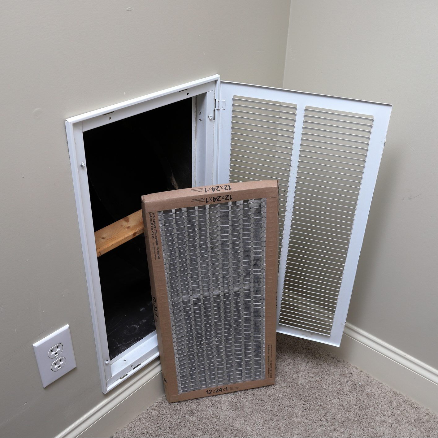 Removing Dirty Air filter for home central air conditioning system