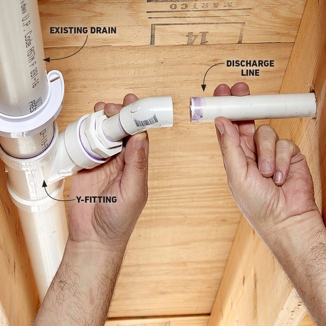 Connect the discharge to the main sewer line