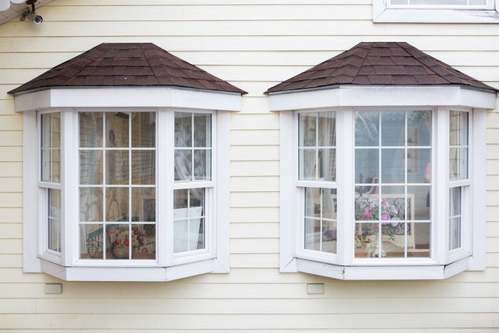 window grids on two windows on exterior of house