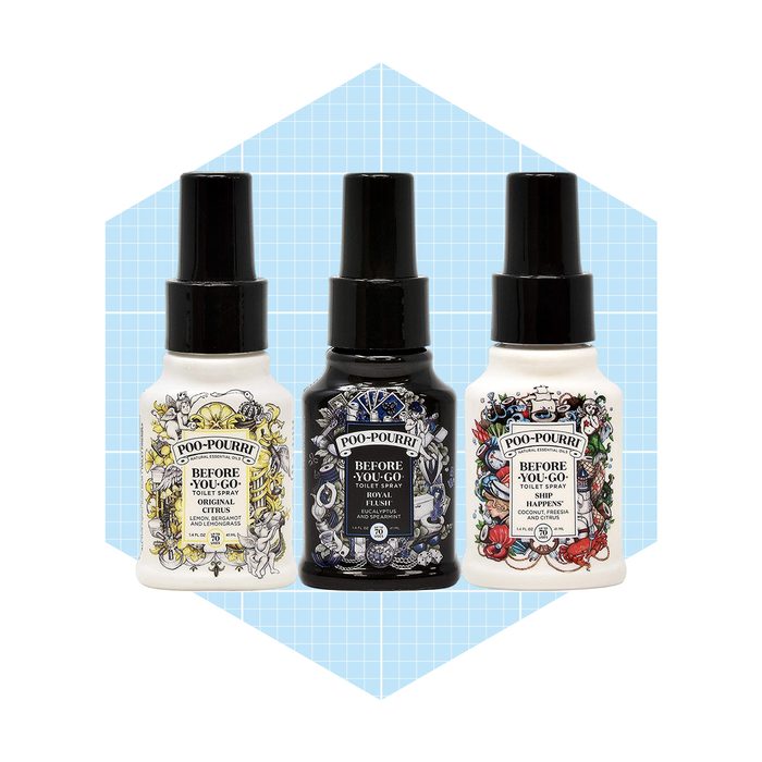 Three bottles of toilet spray from Poo-Pourri are placed against a light blue geometric background, each featuring distinct decorative labels, promoting odor prevention.