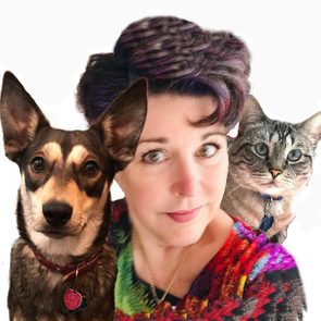 A woman poses with a dog and a cat. The woman, dressed in a colorful top, gazes directly at the viewer, surrounded by a plain background.