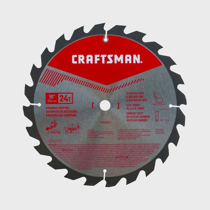 A circular saw blade, featuring 24 teeth, is designed for cutting wood. It has instructions in red and black graphics on its surface.