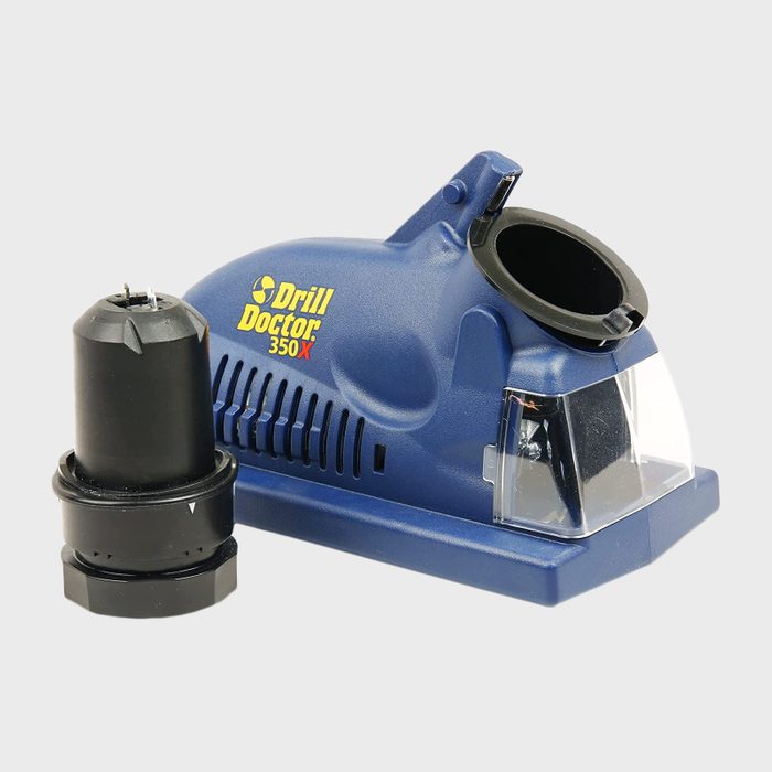 A blue drill bit sharpener sits next to a black drill bit holder, designed for sharpening tools, set against a plain light background.