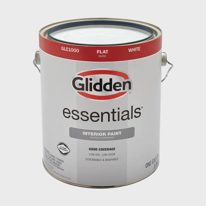 A paint can rests upright, containing white interior paint. It features a label with product details and branding, set against a neutral background.